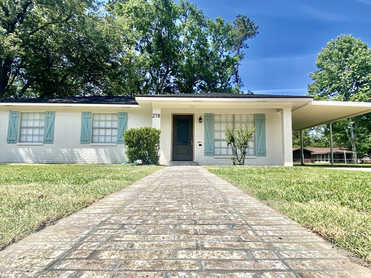 White house with light blue shutters