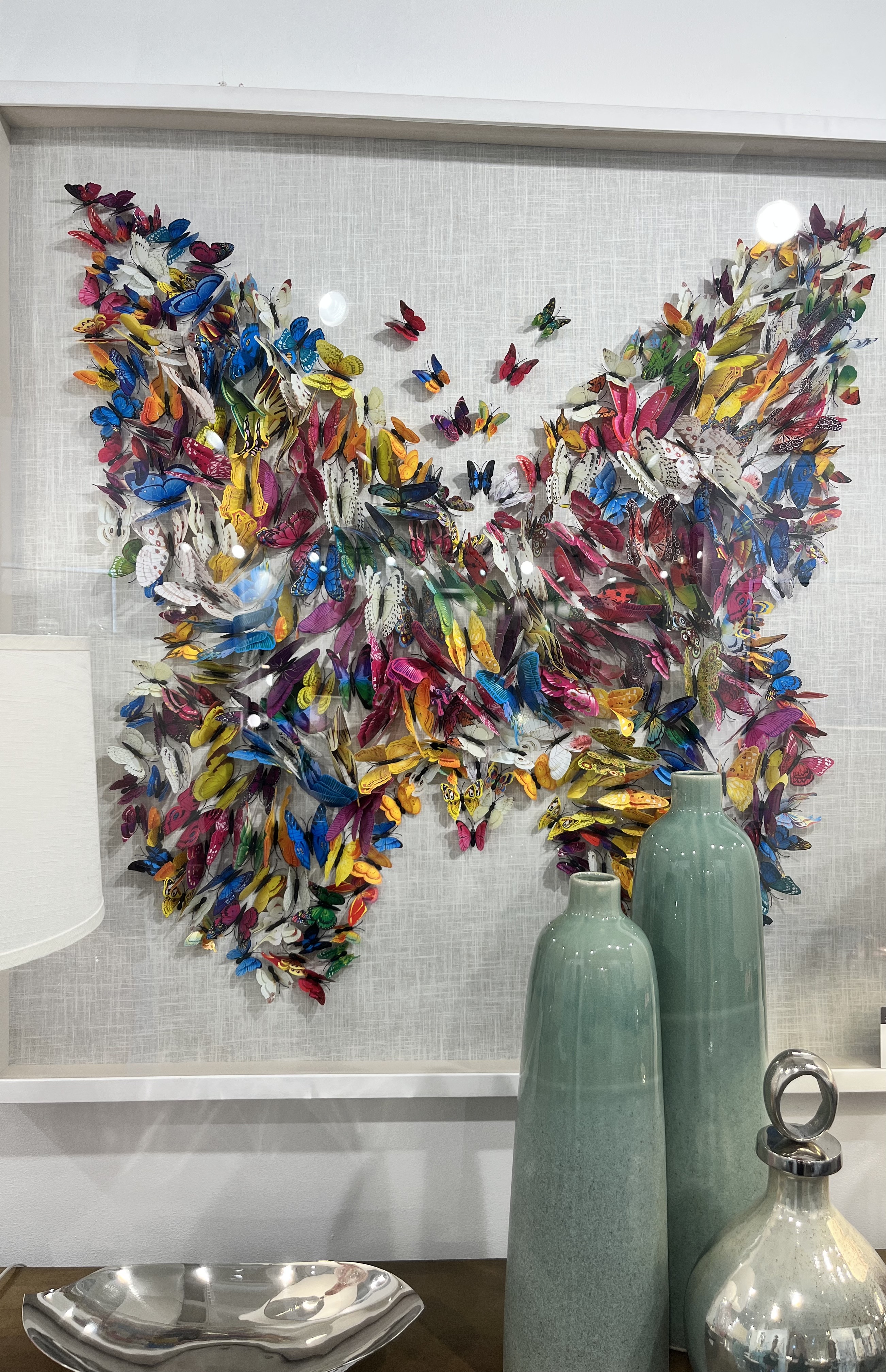 tiny paper butterflies that make up one larger butterfly