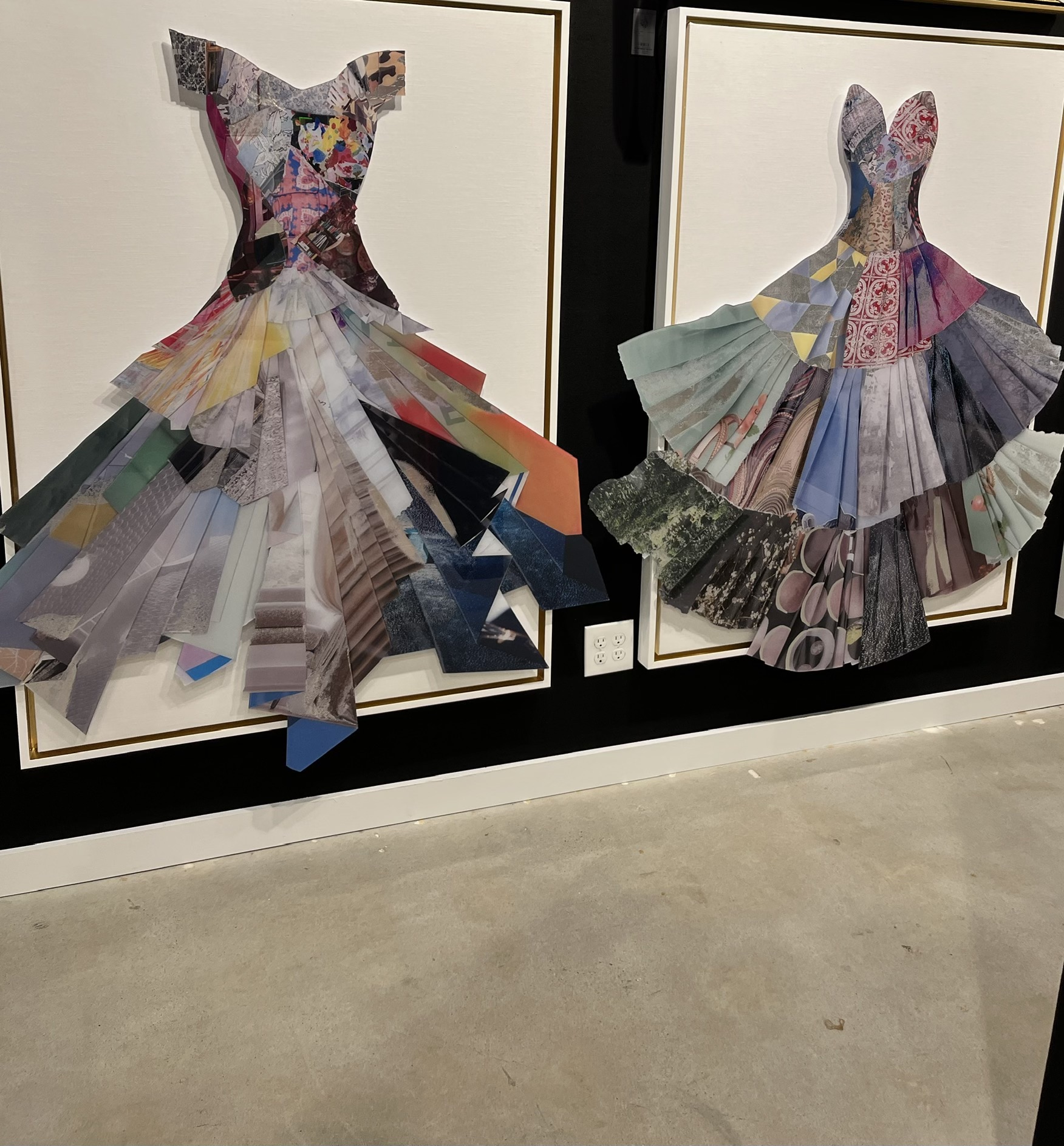 Picture of dresses that are suspended off the canvas